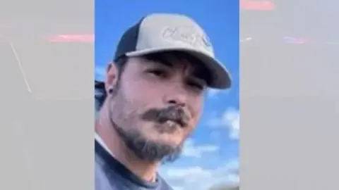 Law enforcement find body they think US man suspected in murdering his daughters